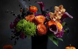 This Halloween designer's choice mix includes a variety of our freshest blooms that are in hues of green, yellow, orange, purple with black accents. These bold colors and unique shapes capture the playful and spooky essence of Halloween.